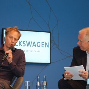Panel 1: Peter Schlicht (Volkswagen) und Frank Riemensperger (Accenture)